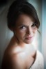 A right of portrait of Silvia wearing her wedding dress as she gets ready for her wedding at her Bothell home. (Photo by Scott Eklund/Red Box Pictures)