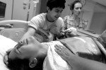 Maria struggles through birth on May 6, 2004, in Dallas.