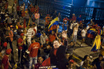 Thousands of Chavez supporters take to the streets in downtown Caracas to celebrate his re-election.