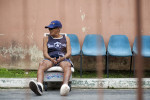  Milton Conraolo da Silva, 74, sits near the entrance of the leprosarium at Colonia Antonio Alexio in Manaus, Brazil on Saturday, March 17, 2012.  He was interned at the now defunct Paricatuba Leprosarium outside Manaus at the age of 13. In 1967, he came to live in Colonia Antonio Aleixo. 