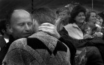 Kosovars embrace in relief after they safely crossed the Albanian border from Kosovo.