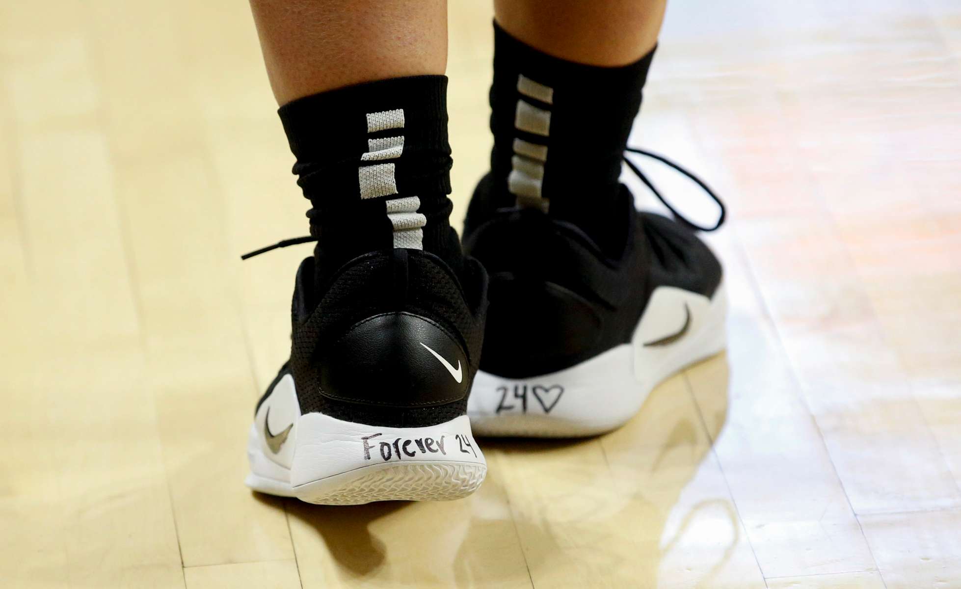 Oregon's Sabrina Ionescu paid her respects to Kobe Bryant on her shoes. Ionescu did not come out until 15 minutes before the game started at Gill Coliseum. [Andy Nelson/The Register-Guard] - registerguard.com