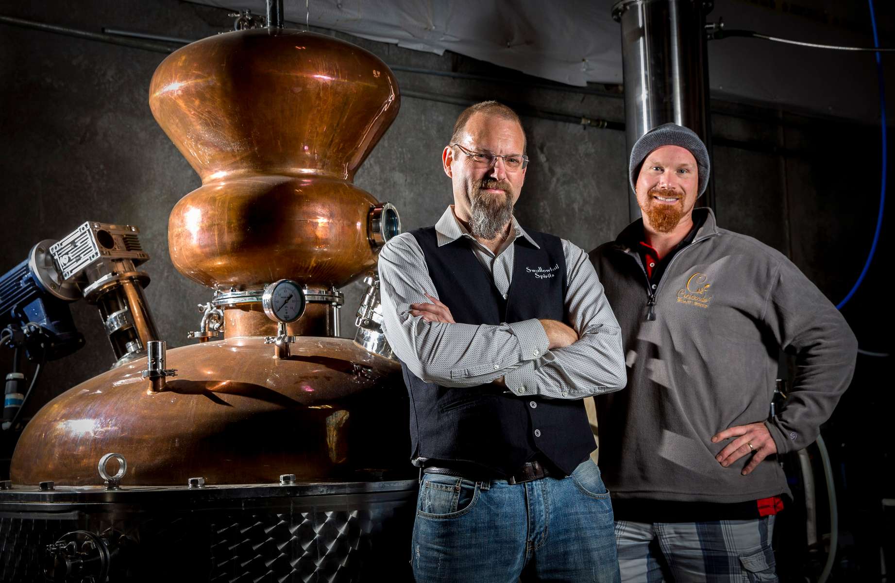 Kevin Barrett, owner of Swallowtail Spirits in Springfield,  and Kyle Akin, owner of Crescendo Spirits in Eugene, are among the main organizers of the Southern Willamette Craft Distillers, a group of local spirits distillers who are trying to raise the visibility of their buisinesses by offering a “passport” to the public that provides free tastings and other perks. The group also is working with the larger Oregon Distillers Guild to lobby for regulation changes and reduced state taxes on their industry.