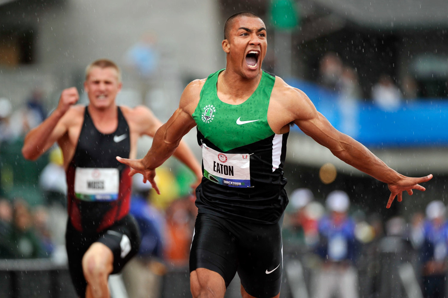 Ashton Eaton crosses the finish line setting a world record in the decathlon 100 meters with a time of 10.21. The event was the first of a record-shattering Olympic Trials.