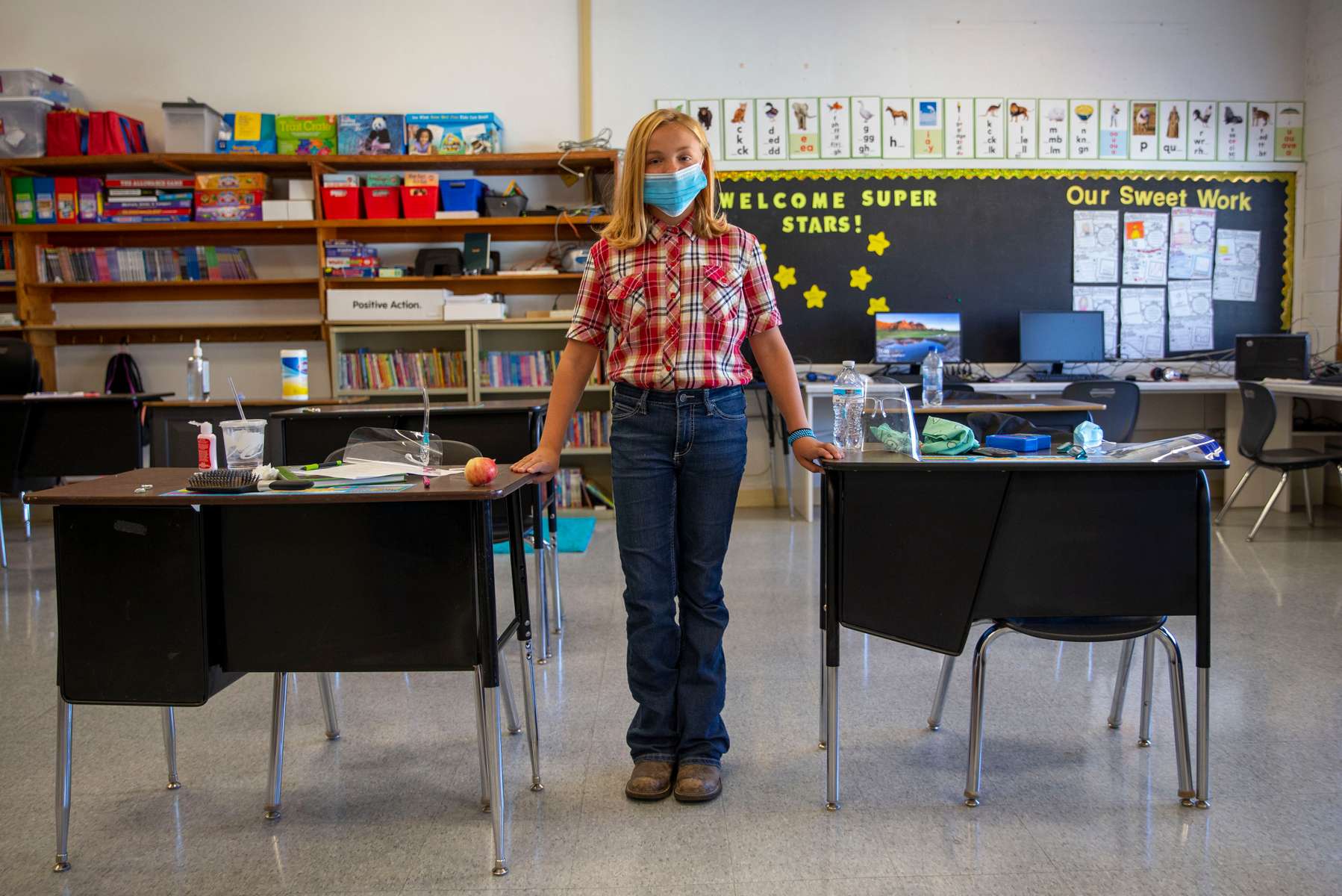Sixth grader Katie Newton in her classroom Sept. 2, 2020, in Spray, Oregon. Newton has been a Spray student her whole life. “We actually get to go to school and, you know, we get to play outside and actually get to interact and stuff,” Newton said.