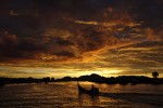 A fisherman returns up the Krueng River in Banda Aceh, Indonesia at the end of the day. The fishing industy has recovered after the losses from the Indian Ocean tsunami in 2004.