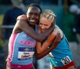 Kansas' Sharon Lokedi is hugged by New Mexico's Alice Wright after Lokedi's NCAA title win in the 10,000 meters during the second day of the NCAA Track and Field Championship at Hayward Field Thursday, June 7, 2018 in Eugene, Ore. Lokedi broke the NCAA meet record with a time of 32:09.20 while Wright finished fourth in the race. [Andy Nelson/The Register-Guard] - registerguard.com