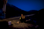 On the way to Murgab, Tajikistan 2011-A Chinese truck driver on a stopover towards Murgab, having his dinner.