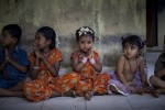 Children sit at a preschool in Kerala, India. Kerala has the lowest maternal and infant mortality in the country, comparable to many wealthy countries. In an effort to maintain their reputation as a place that outperforms in health, despite its poor economic state, the government is attempting to address chronic diseases, currently one of the most pressing concerns in the state.