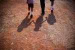 Students from a resource room classroom walk to school in Pilerne Village, Goa.