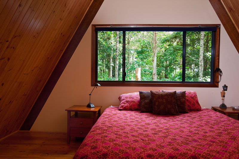 Guest bedroom in treehouse at Rose Gums Wilderness Retreat