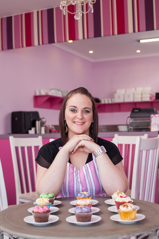 Profile photo of business owner in cupcake store, Cairns