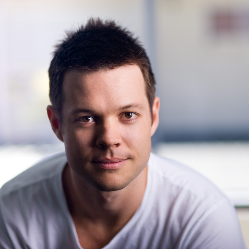 Corporate headshot of a male graphic designer in Cairns