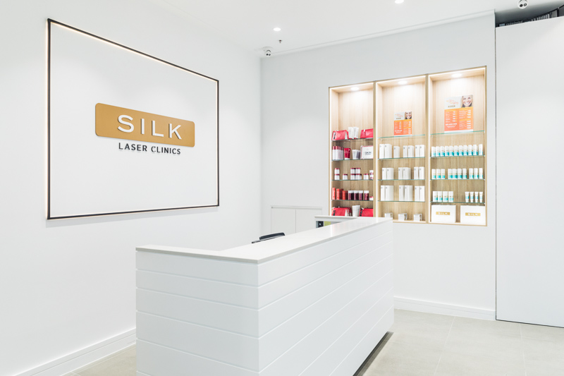 The front counter and product shelves in the Silk Laser Clinic Cairns