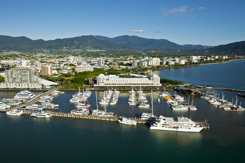 Aerial view of boats moored in the Marlin Marina and the Cairns city waterfront