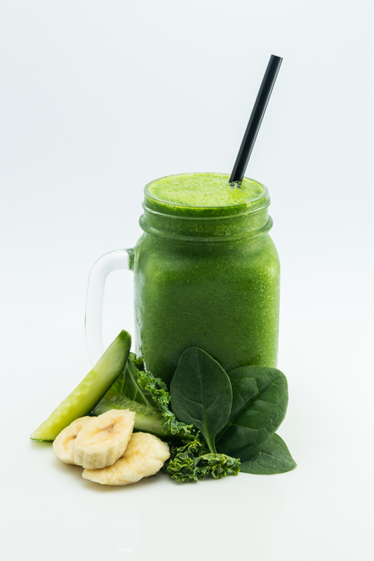 Glass of fresh juice with ingredients of kale, banana and cucumber at Frydays Fish & Chippery, Cairns