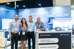 Group photo of staff at supplier booth at QUESTnet 2018 Conference trade exhibit in Cairns 