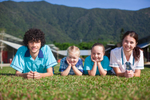 Portrait of older students with school's youngest students, Cairns