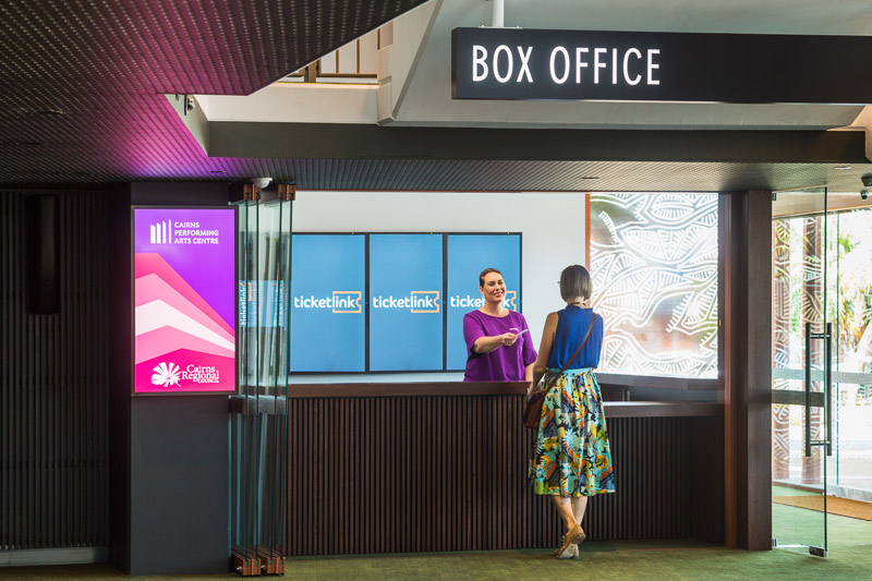 Customer buying ticket at the Box office of the Cairns Performing Arts Centre 