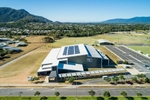 Aerial view of solar panels on commercial building, Cairns