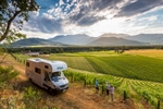 A couple with motorhome getting a tour of Feathertop Winery in Porepunkah, Victoria 