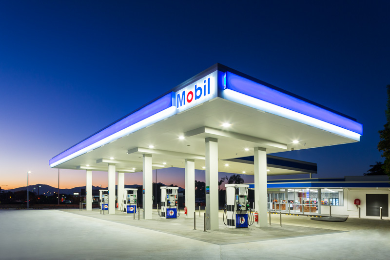 The Mobil Service Station in Edmonton, Cairns illuminated at twilight