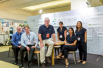 Team photo of supplier booth at ASCS2015 Conference in Cairns

