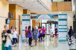 Delegates walking through trade exhibit entry at Cancer Nurses Society of Australia 19th Annual Congress in Cairns 

