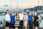 Team photo of Cairns accounting firm staff with marina background
