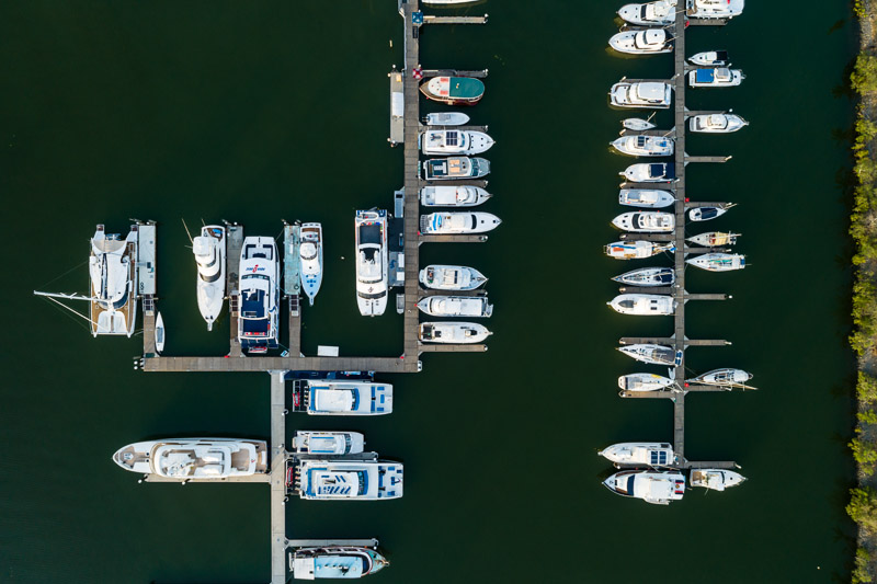 Aerial, view of boats moored in marina at Port Douglas