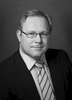 Black and white headshot of a male financial services advisor, Cairns
