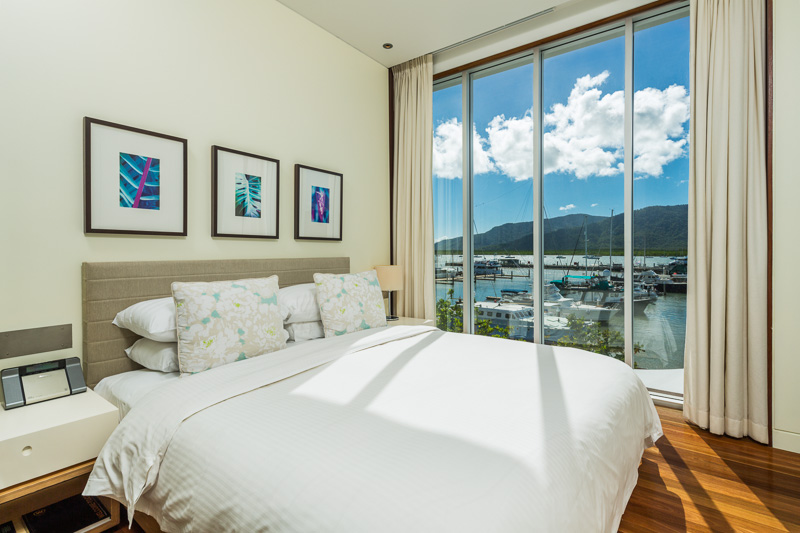 Hotel bedroom with views over the marina at Shangri-La Cairns