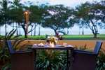 Dining table set for two overlooking Esplanade, Cairns
