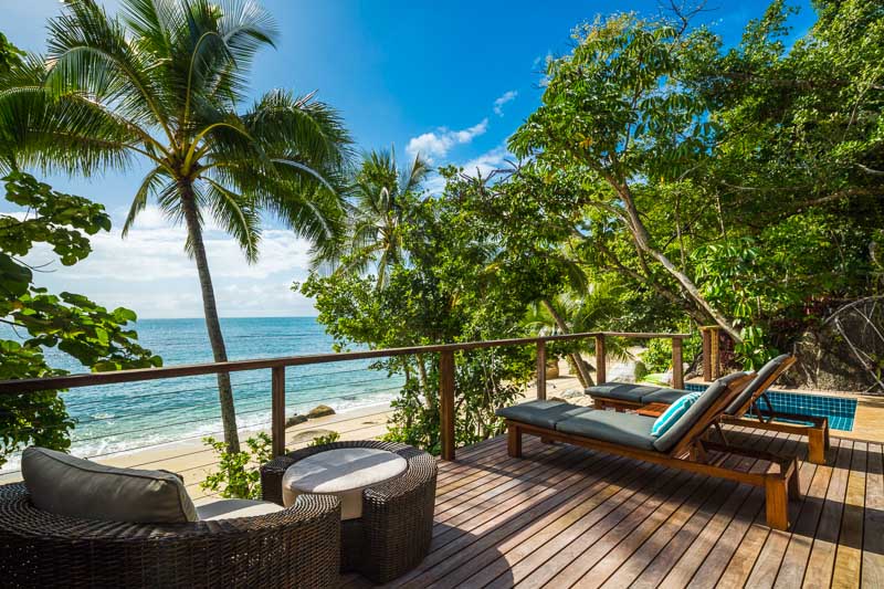 Deck of beach villa overlooking the Coral Sea at Bedarra Island Resort