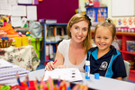Portrait of a teacher and young student in the classroom, Cairns