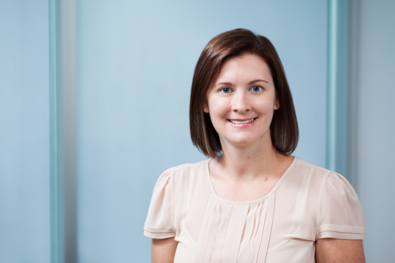 Professional head shot for female accountant with office background, Cairns