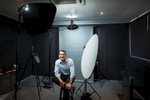 Business executive sitting in a location photo studio setup, Cairns 