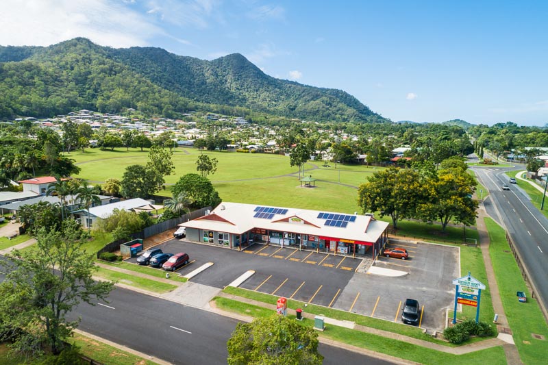 Aerial view of shopping village and carpark, Cairns
