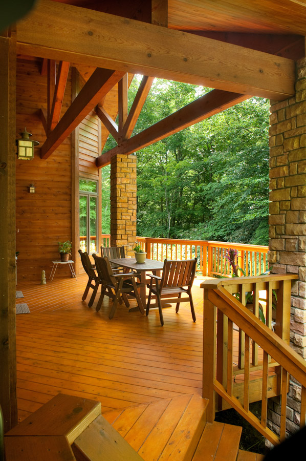 Exterior covered deck of custom designed home by Pavelchak Architecture in Grandfather Golf and Country Club in Linville, North Carolina, near Boone.