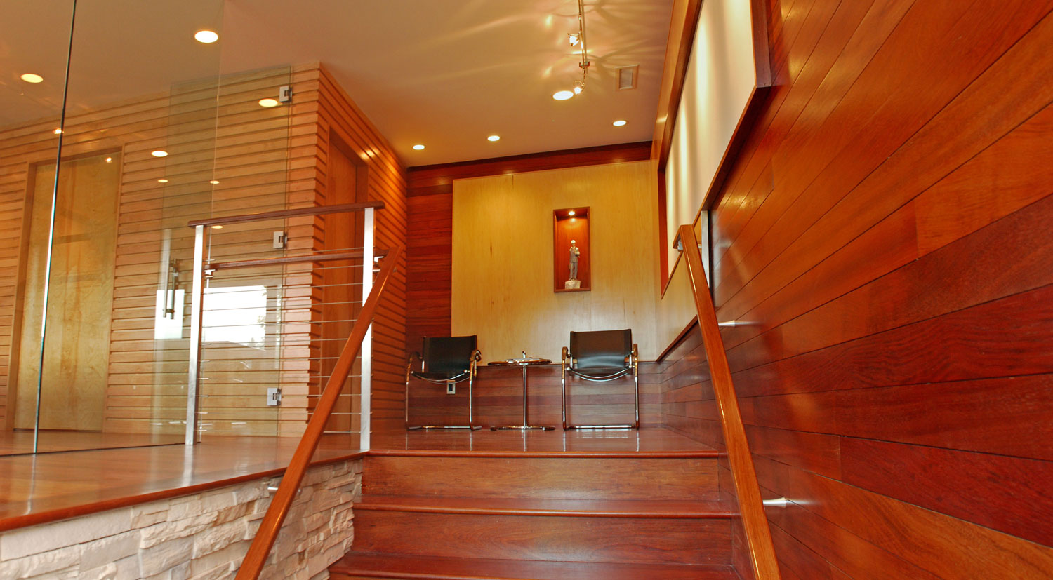 Pavelchak Architecture's entry staircase showcasing modern, clean design aesthetic with beautiful brazillian cherry and maple hardwoods.   Located in downtown Banner Elk, North Carolina near Boone. 