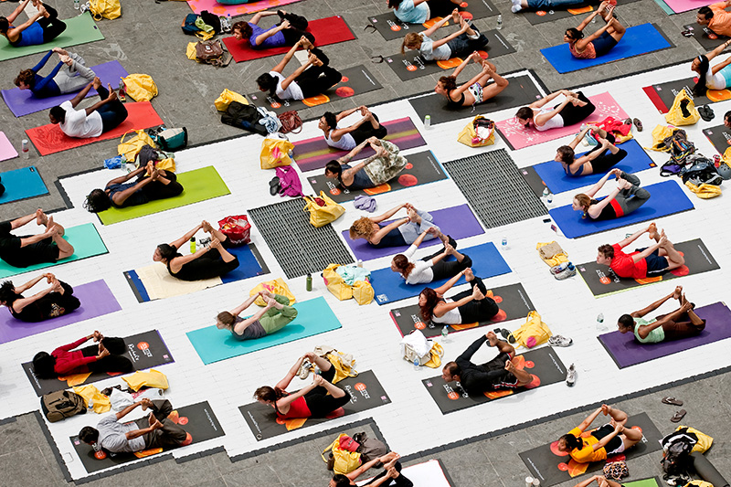 Yoga enthusiasts participate in {quote}Solstice in Times Square{quote} on June 21, 2009.  