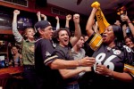 Diehard Steelers fans (from left to right) Rhonda Yantiss, Chris Marasco, Omar Gadalla, all from Manhattan and Terri Shaw, from Staten Island, cheer during a first half Steelers touchdown at Ship of Fools in the Upper East Side, Sept. 10, 2009.