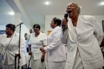 Members of the ministry choir sing a song of praise at Blanche Memorial Baptist Church in Jamaica, Queens, Feb. 7, 2010.