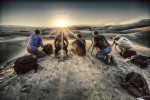group shot at sunrise on the dunes