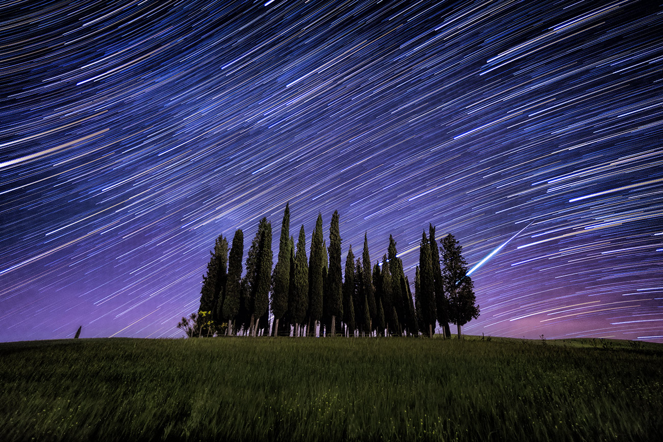 Star trails and giant meteor in Val D'Orcia