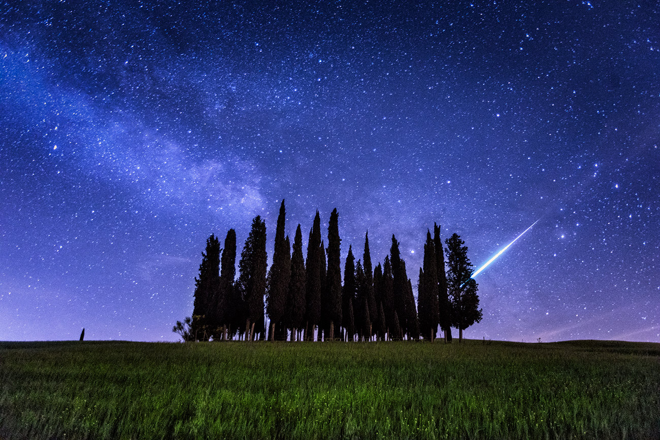 Meteor and Milky Way over Tuscany