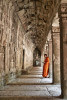 Monk reading inside Angkor Wat Temple