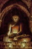 Buddha with candles in Bagan