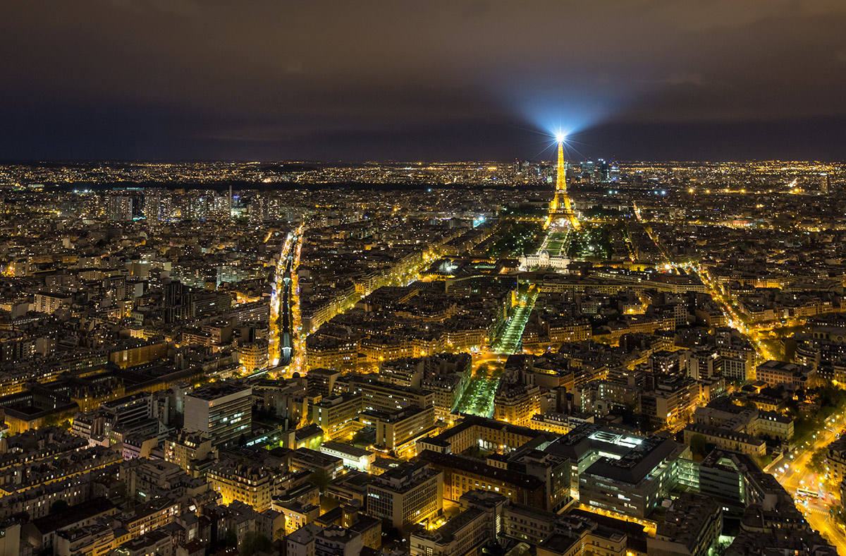 The amazing Eiffel Tower after dark from above