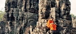 Monk reading in the Bayon of Angkor Wat Temple